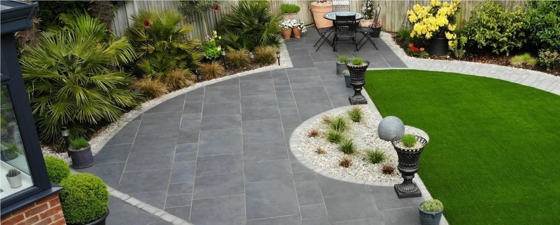 Block paved driveway with Coastline branded workwear and van
